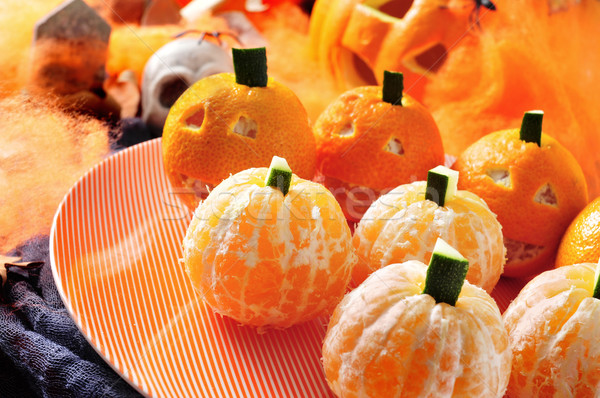 mandarines ornamented as Halloween pumpkins Stock photo © nito