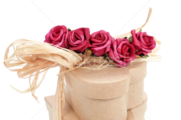 heart-shaped gift boxes tied with natural raffia and topped with Stock photo © nito