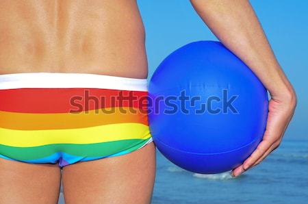 Stock photo: man with a rainbow-patterned kerchief in his wrist