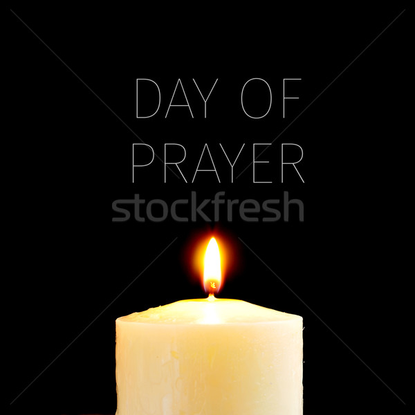 lit candle and text day of prayer Stock photo © nito