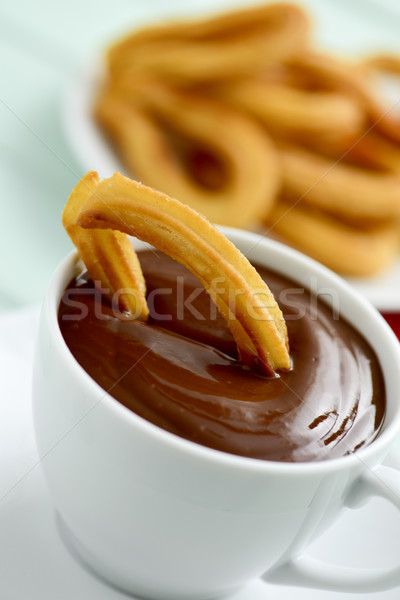 churros con chocolate, a typical Spanish sweet snack Stock photo © nito