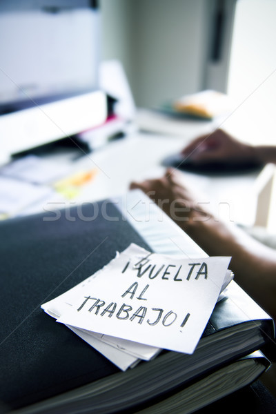 man at office and text back to work in spanish Stock photo © nito