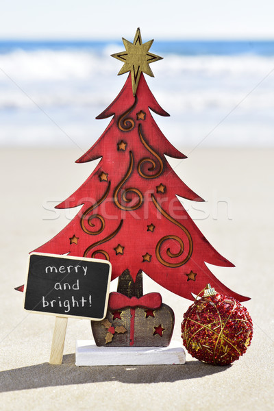 Stock photo: christmas tree and text merry and bright on the beach