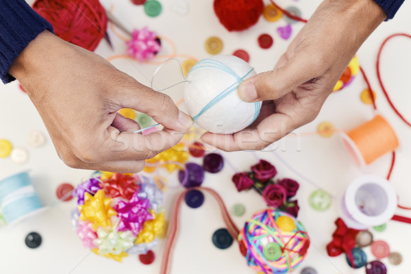 man making a handmade christmas ball Stock photo © nito