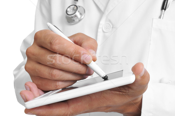 Lekarza tabletka igła pióro człowiek medycznych Zdjęcia stock © nito