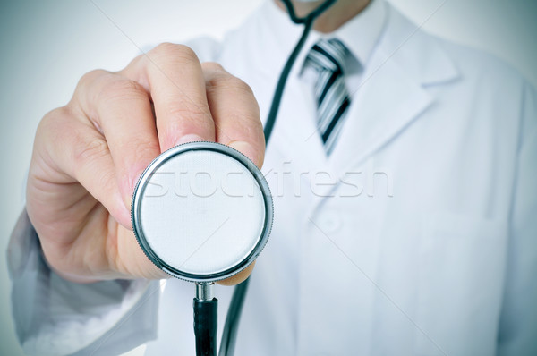 doctor using a stethoscope Stock photo © nito