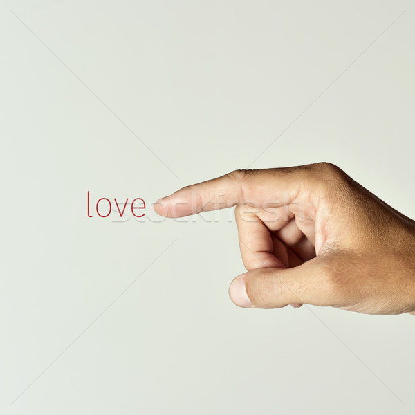 man pointing the word love Stock photo © nito