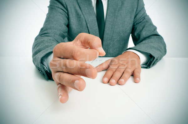 man in suit gesturing as affirming his speech Stock photo © nito