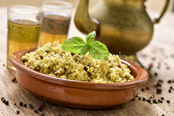 couscous with vegetables and tea on a rustic wooden table Stock photo © nito