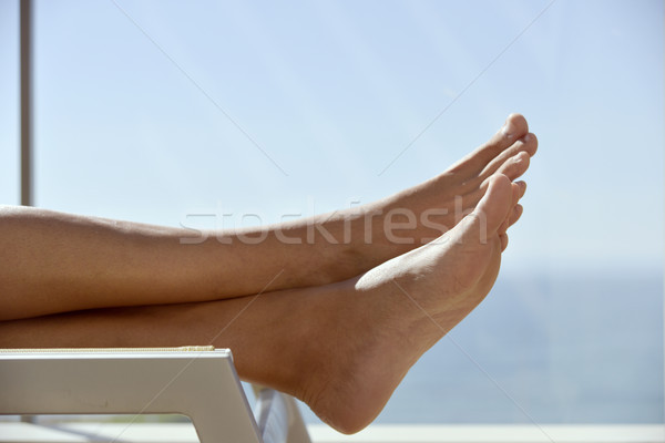 young man relaxing in a sunlounger Stock photo © nito