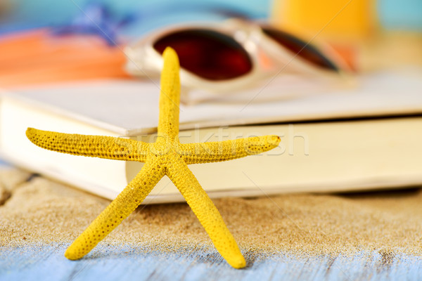 starfish, book and sunglasses Stock photo © nito