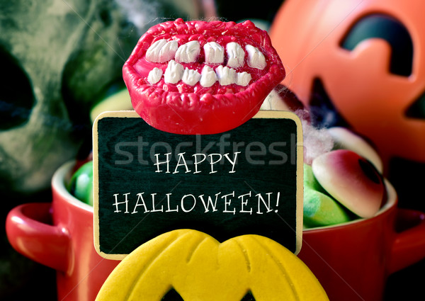text happy halloween in a chalkboard Stock photo © nito