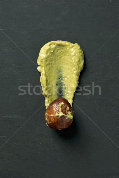 guacamole or smashed ripe avocado and pit Stock photo © nito