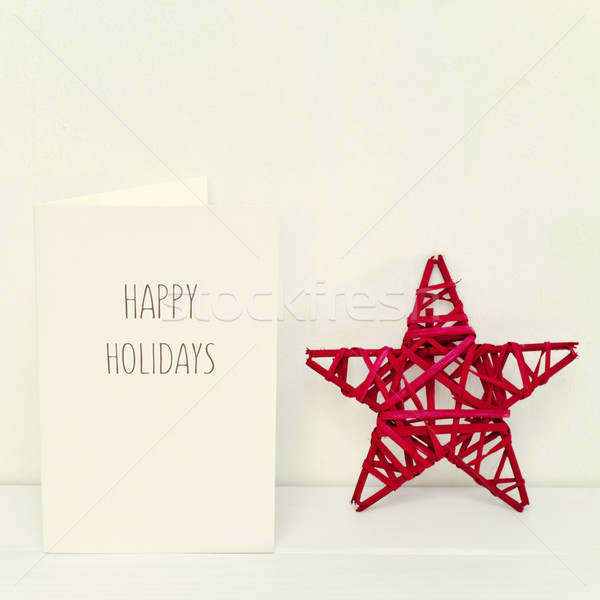 Christmas star and text happy holidays Stock photo © nito