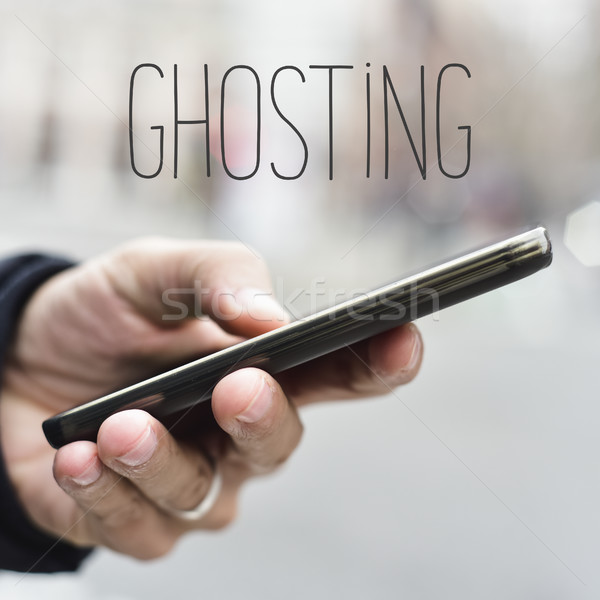 man with smartphone and text ghosting Stock photo © nito