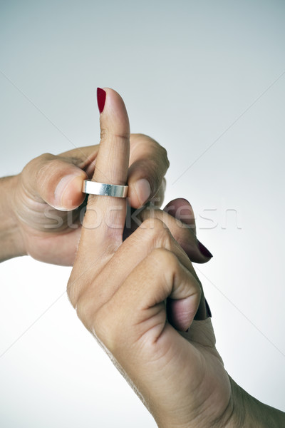 man putting on or putting off a ring from the finger of a woman Stock photo © nito