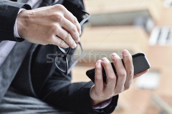 young businessman using a smartphone Stock photo © nito