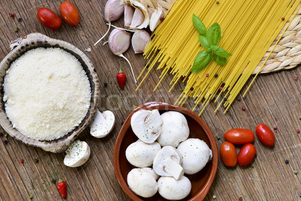 grated cheese, garlics, mushrooms, cherry tomatoes and spaghetti Stock photo © nito