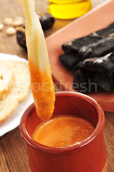 Stock photo: barbecued calcots, sweet onions, and romesco sauce typical of Ca