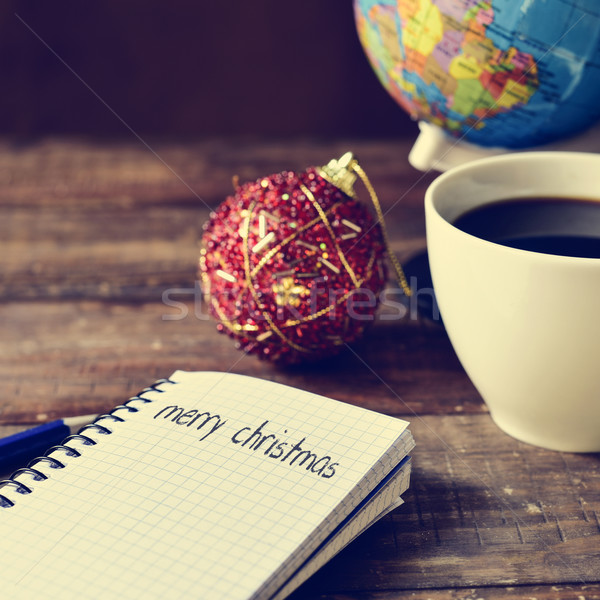 bauble, cup of coffee, globe and text merry christmas Stock photo © nito