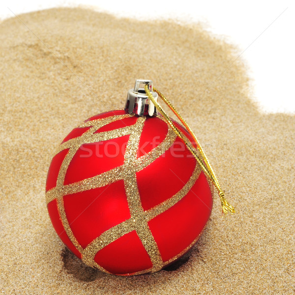 christmas ball on the sand Stock photo © nito