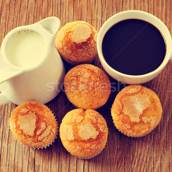 milk, coffee and muffins on a rustic table Stock photo © nito