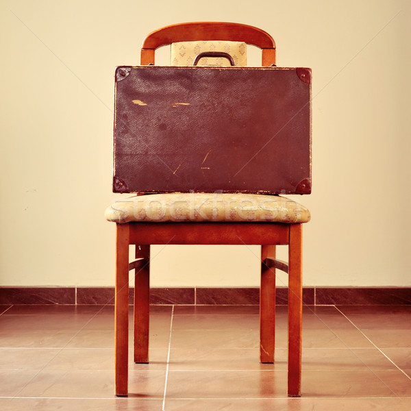 old suitcase on a chair Stock photo © nito