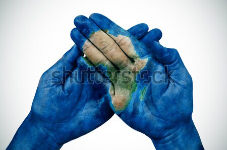 world map and rainbow flag in the hands Stock photo © nito