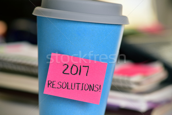 sticky note with text 2017 resolutions in a cup Stock photo © nito