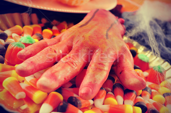 amputated hand and Halloween candies, filtered Stock photo © nito