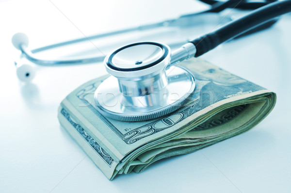 Egészségügy ipar sztetoszkóp dollár bankjegyek fogalmak üzlet Stock fotó © nito