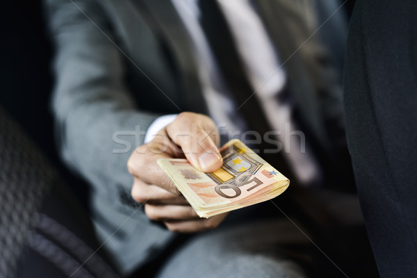 man with a wad of euro bills Stock photo © nito