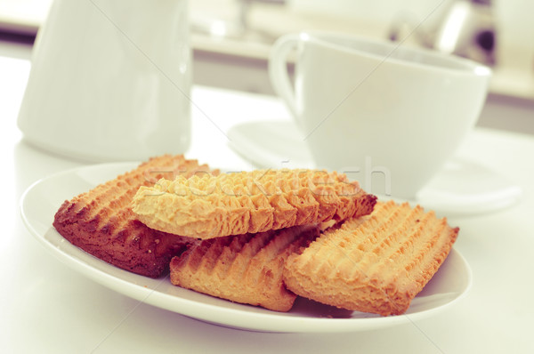 homemade biscuits and coffee or tea on the kitchen table Stock photo © nito