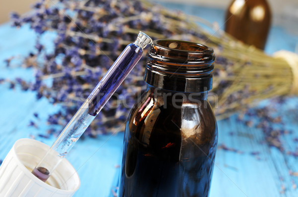 dropper bottle with flower essence and lavender flowers Stock photo © nito