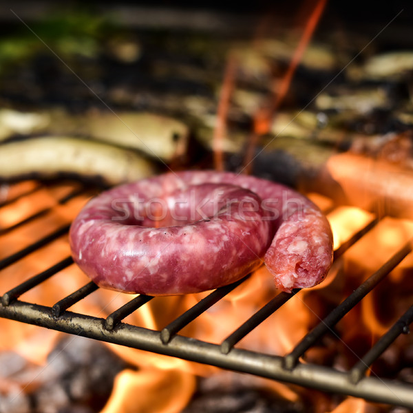 grilling a pork meat sausage Stock photo © nito