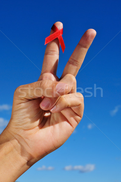 Luptă SIDA om mână semna Imagine de stoc © nito