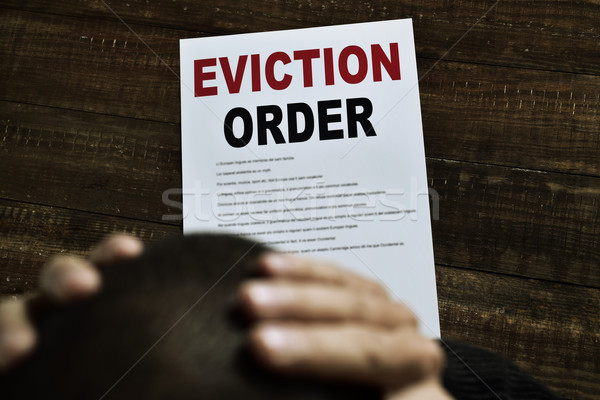 young man who has received an eviction order Stock photo © nito