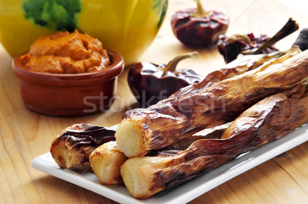 barbecued calcots, catalan sweet onions, and romesco sauce Stock photo © nito
