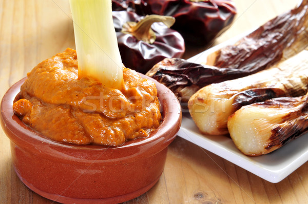 barbecued calcots, sweet onions, and romesco sauce typical of Ca Stock photo © nito