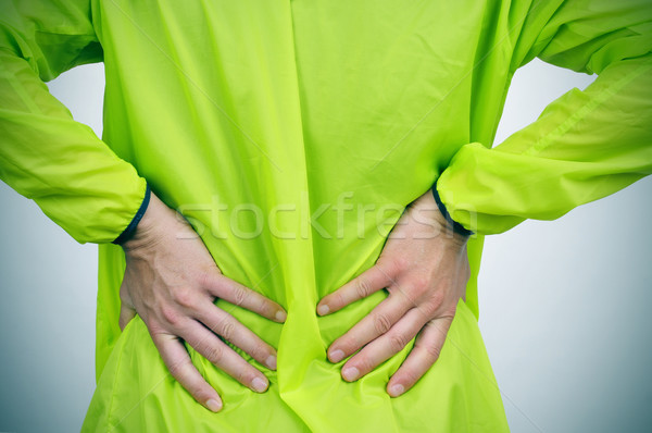 young sportsman with low back pain Stock photo © nito