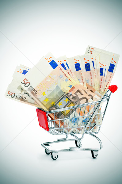 euro banknotes in a shopping cart Stock photo © nito