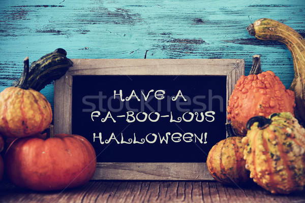 pumpkins and chalkboard with text have a fa-boo-lous halloween Stock photo © nito