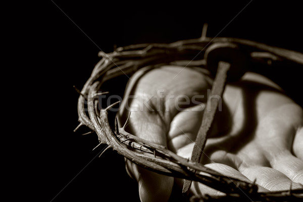 man with a nail and a crown of thorns Stock photo © nito