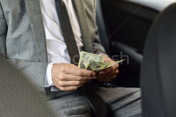 man counting dollar bills Stock photo © nito
