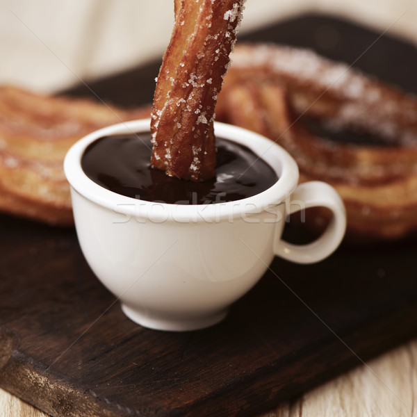 churros con chocolate, typical Spanish sweet snack Stock photo © nito