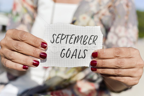 woman with a note with the text september goals Stock photo © nito