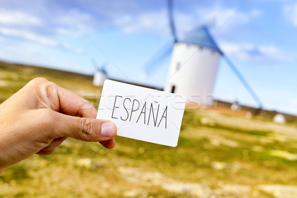 man shows a signboard with the word Espana, Spain, in front of t Stock photo © nito