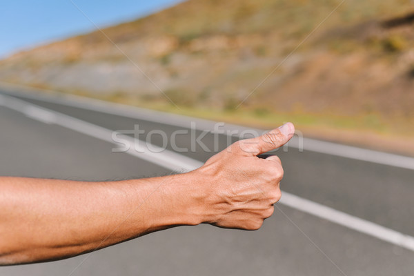 young man hitchhiking Stock photo © nito