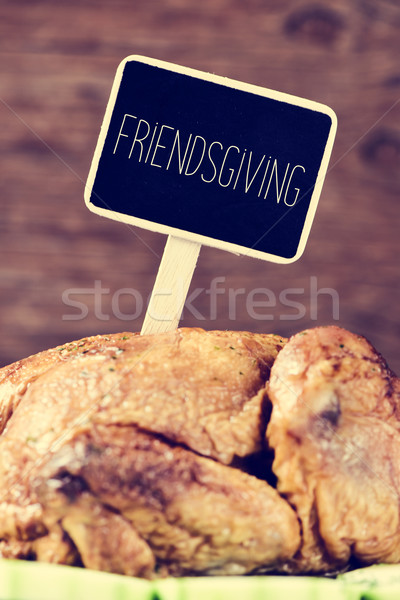 roast turkey with a black label with the text friendsgiving Stock photo © nito