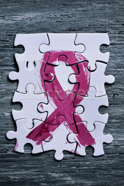puzzle pieces forming a pink ribbon Stock photo © nito